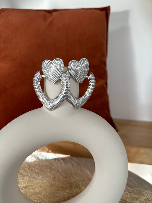 Boucles d’oreilles martelées forme cœur couleur argent